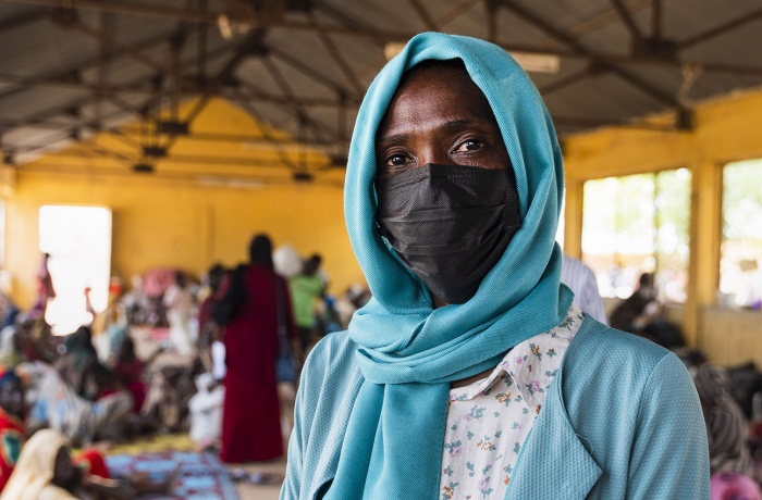 A woman is seen at a poultry farm in Sudan that now hosts hundreds of people displaced by the country's civil war.